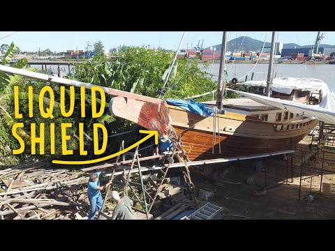 Applying EPOXY resin to the entire hardwood hull of our WOODEN SHIP — Sailing Yabá 125