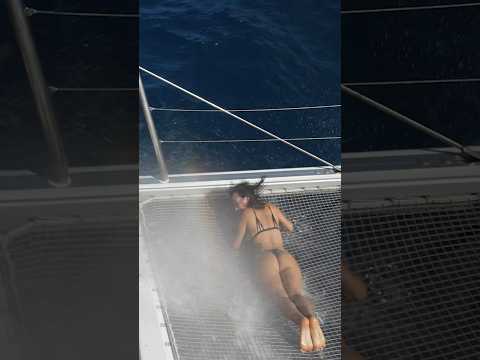 Is this safe! Getting wet on the trampolines #bikini #travel #sailing