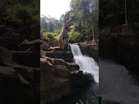 Jumping from the top of a waterfall! #waterfall #bikini #jump